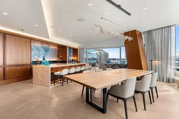 a dining room with furniture window wooden floor
