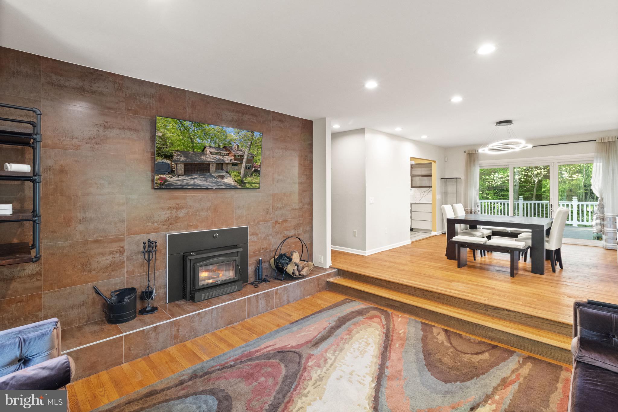9220 Beech Hill Drive Bethesda, MD 20817 - Photo 15 of 50 a living room with furniture and a fireplace