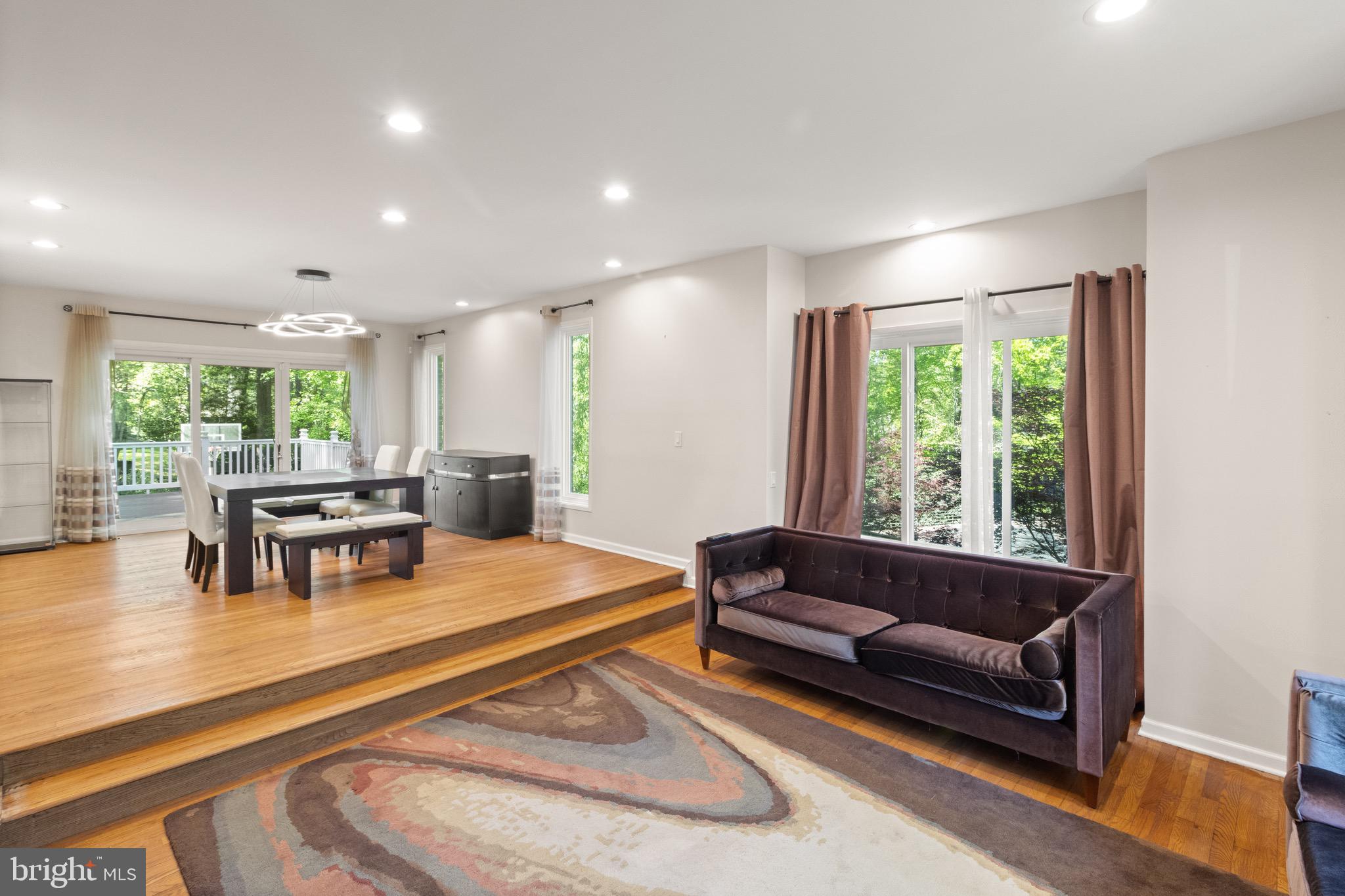 9220 Beech Hill Drive Bethesda, MD 20817 - Photo 16 of 50 a living room with furniture and a large window
