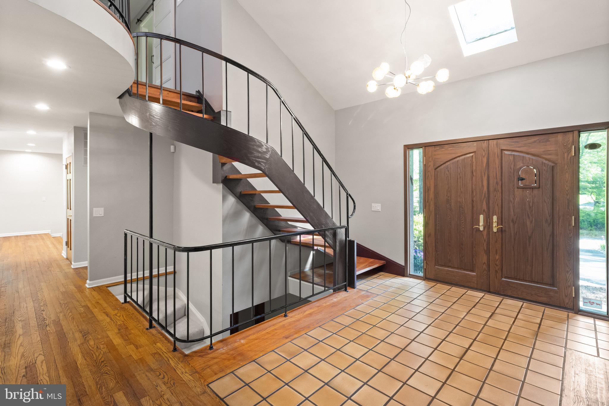 9220 Beech Hill Drive Bethesda, MD 20817 - Photo 19 of 50 a view of entryway and hall with wooden floor