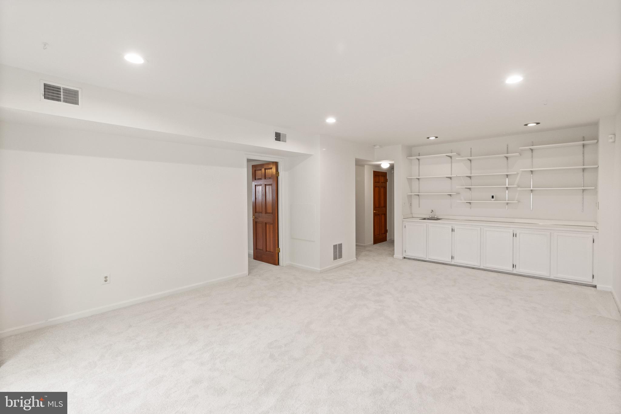 9220 Beech Hill Drive Bethesda, MD 20817 - Photo 38 of 50 a view of an empty room