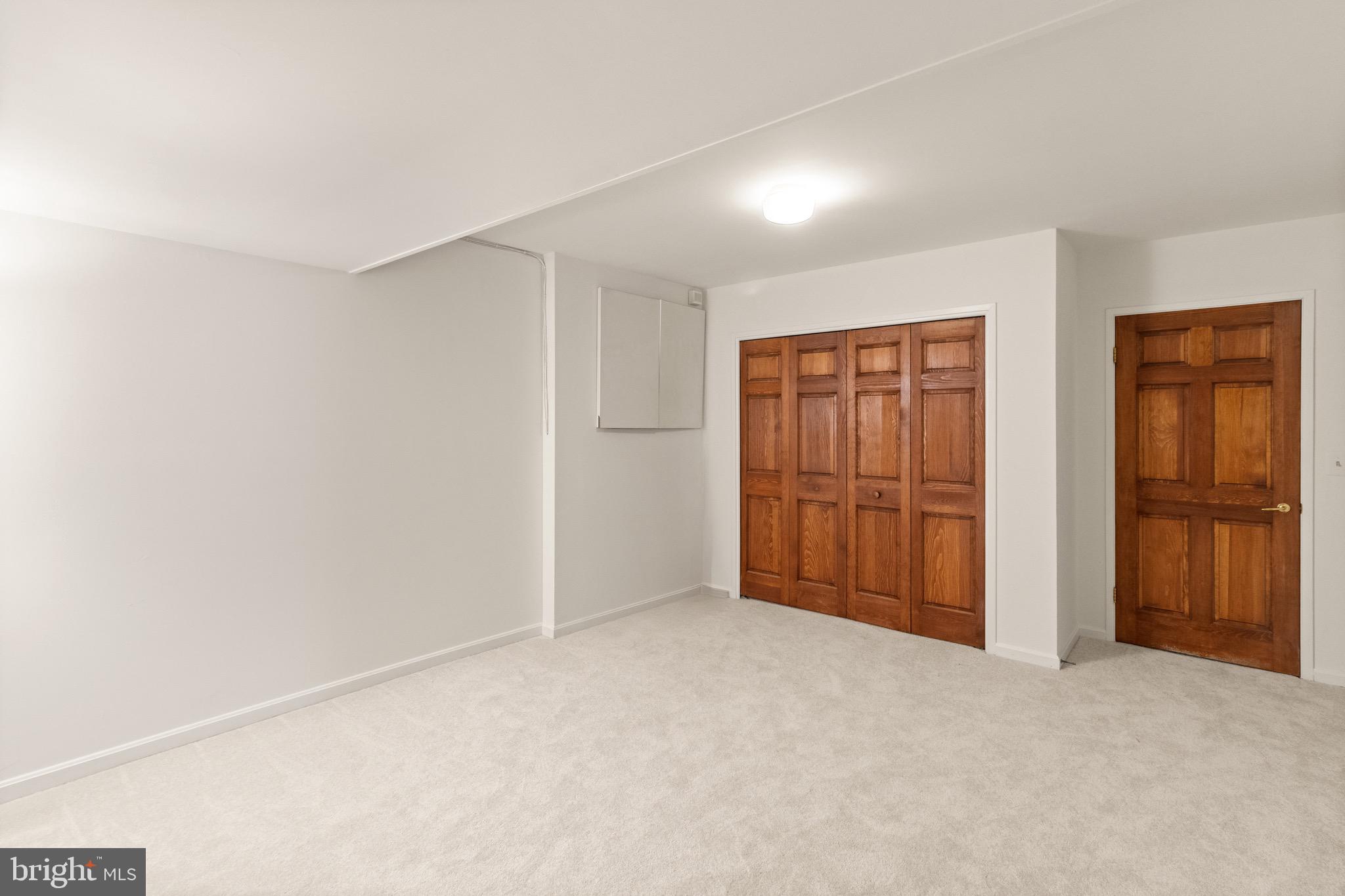 9220 Beech Hill Drive Bethesda, MD 20817 - Photo 42 of 50 a view of an empty room and closet area