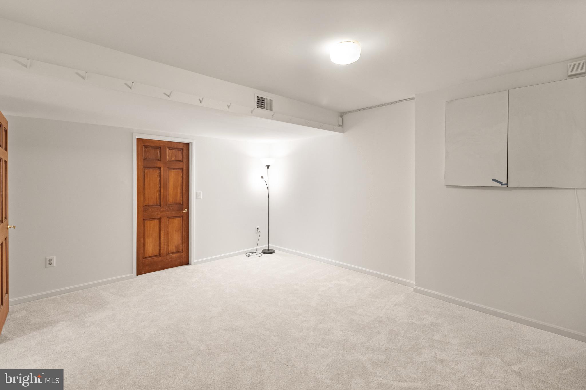9220 Beech Hill Drive Bethesda, MD 20817 - Photo 44 of 50 a view of an empty room