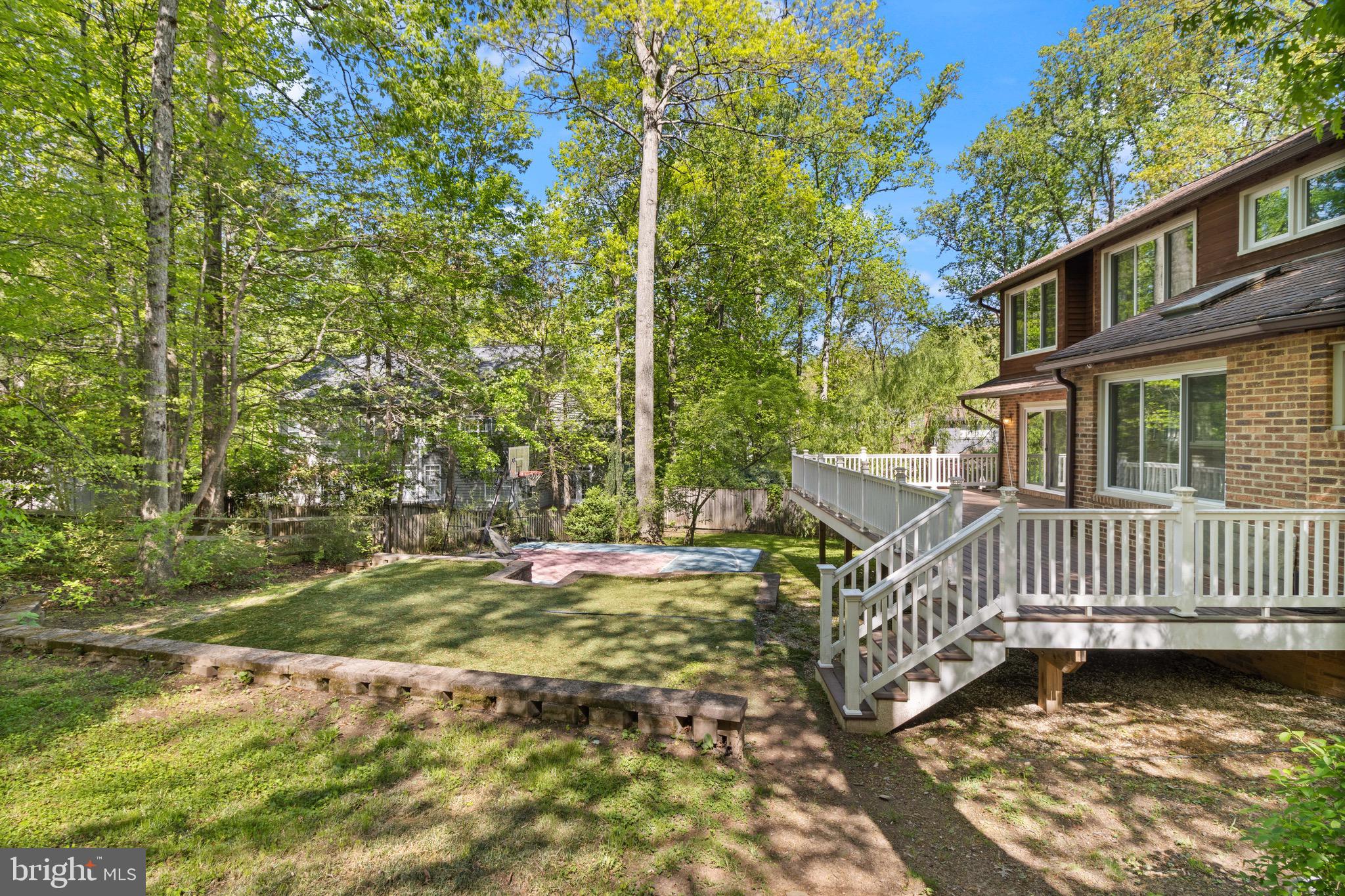 9220 Beech Hill Drive Bethesda, MD 20817 - Photo 50 of 50 a view of a deck with a yard
