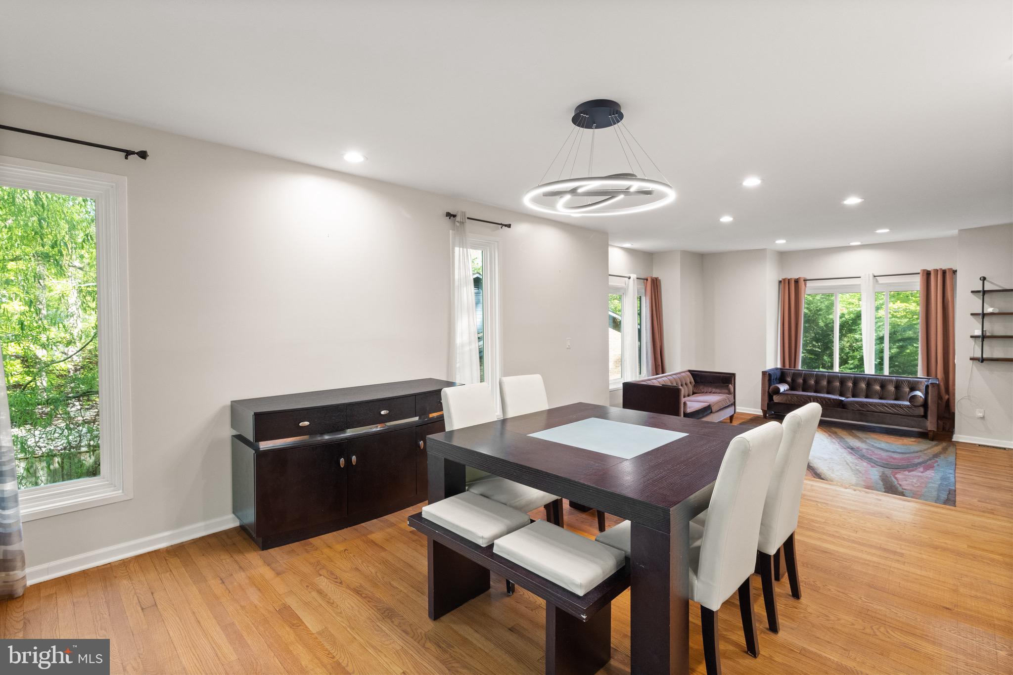 9220 Beech Hill Drive Bethesda, MD 20817 - Photo 9 of 50 a view of a dining room with furniture window and wooden floor