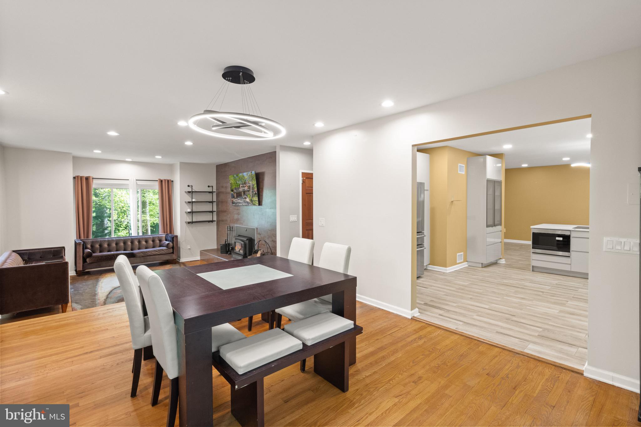 9220 Beech Hill Drive Bethesda, MD 20817 - Photo 10 of 50 a view of a dining room with furniture and wooden floor