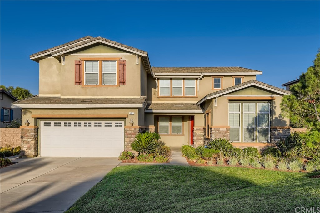 9542 Newbridge Road Riverside, CA 92508 - Photo 1 of 1 a front view of a house with a yard