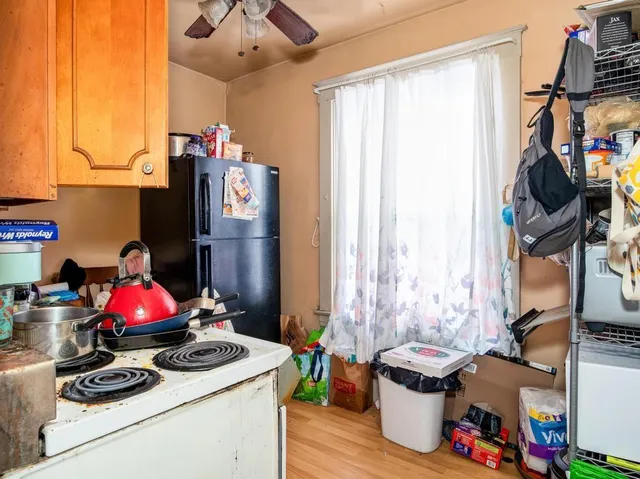 a room with furniture and wooden floor