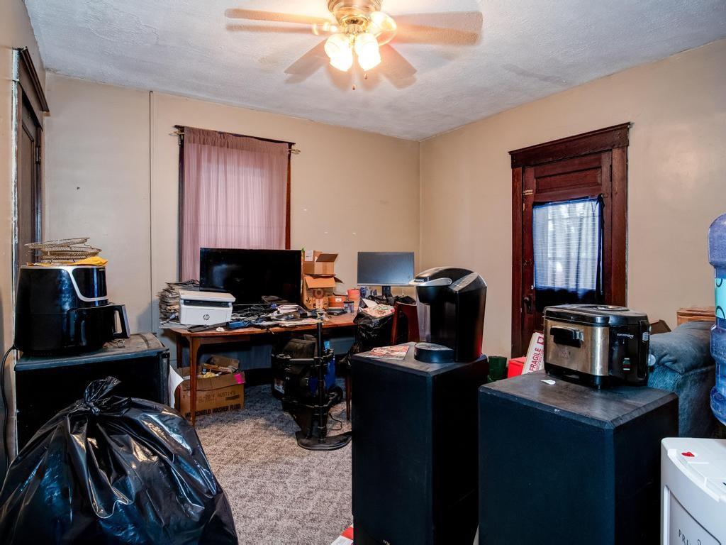406 Connecticut Avenue Rochester, PA 15074 - Photo 19 of 25 a view of a workspace with furniture and a window
