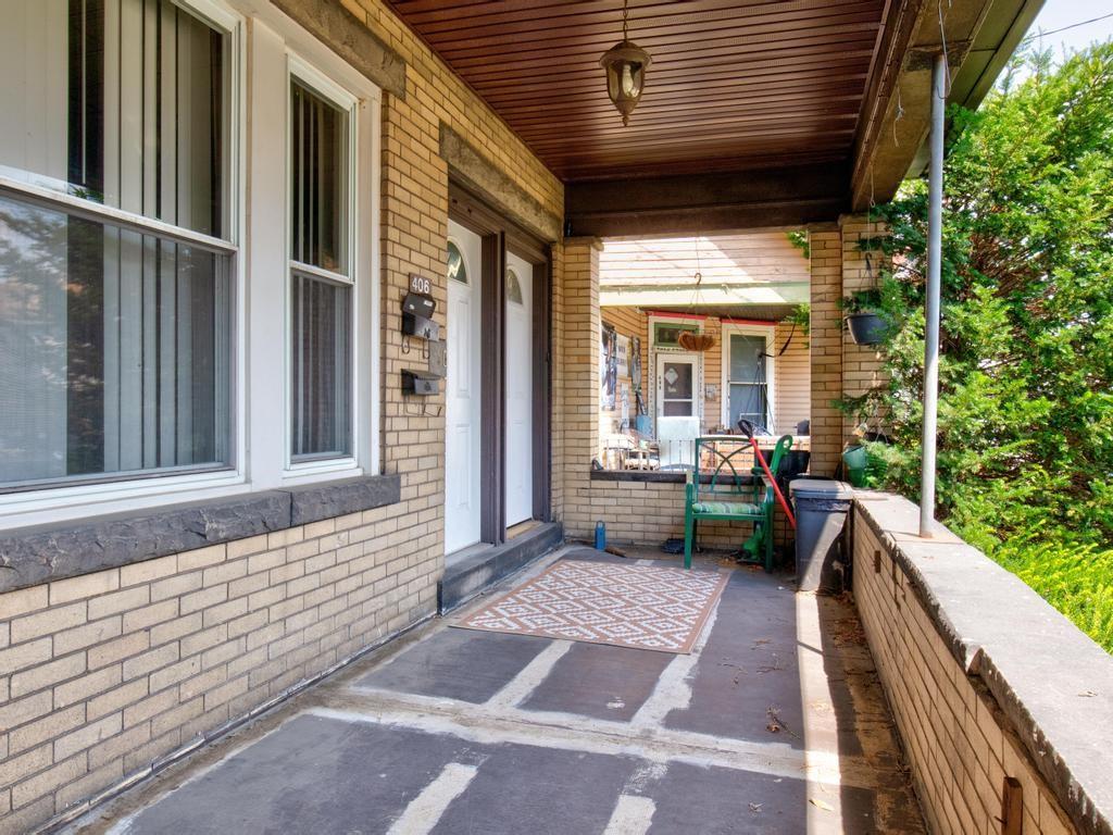 406 Connecticut Avenue Rochester, PA 15074 - Photo 2 of 25 a view of balcony with couch and chairs