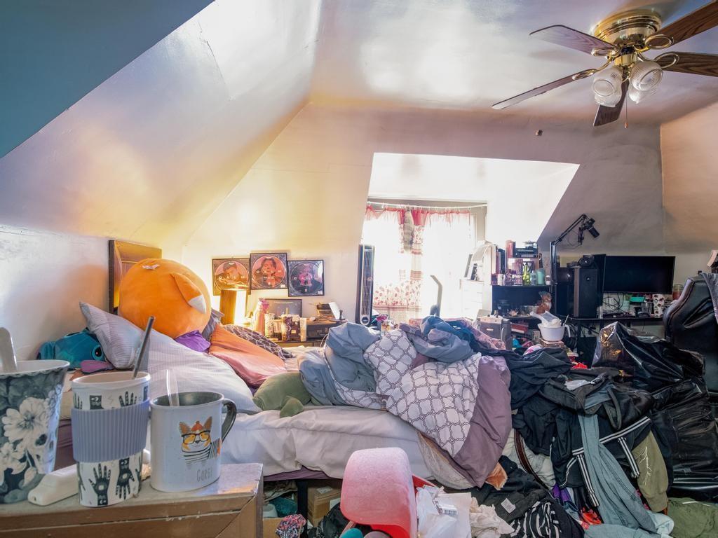 406 Connecticut Avenue Rochester, PA 15074 - Photo 22 of 25 a living room with furniture and a fireplace