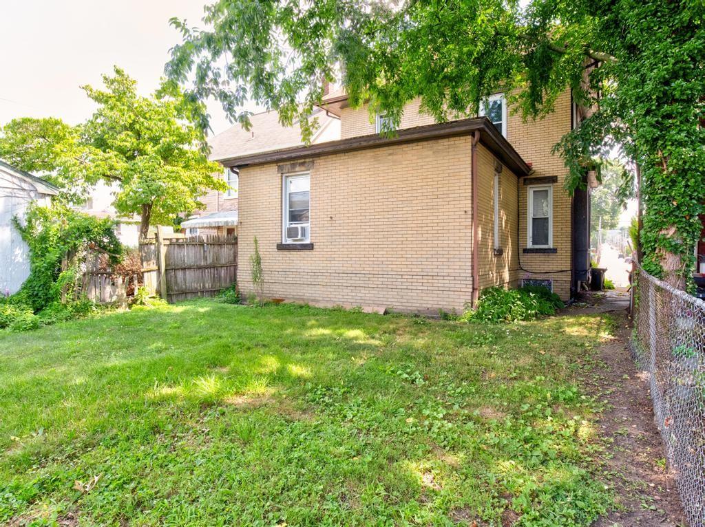 406 Connecticut Avenue Rochester, PA 15074 - Photo 24 of 25 a backyard of a house with lots of green space