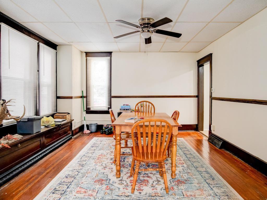 406 Connecticut Avenue Rochester, PA 15074 - Photo 10 of 25 a living room with furniture and a rug