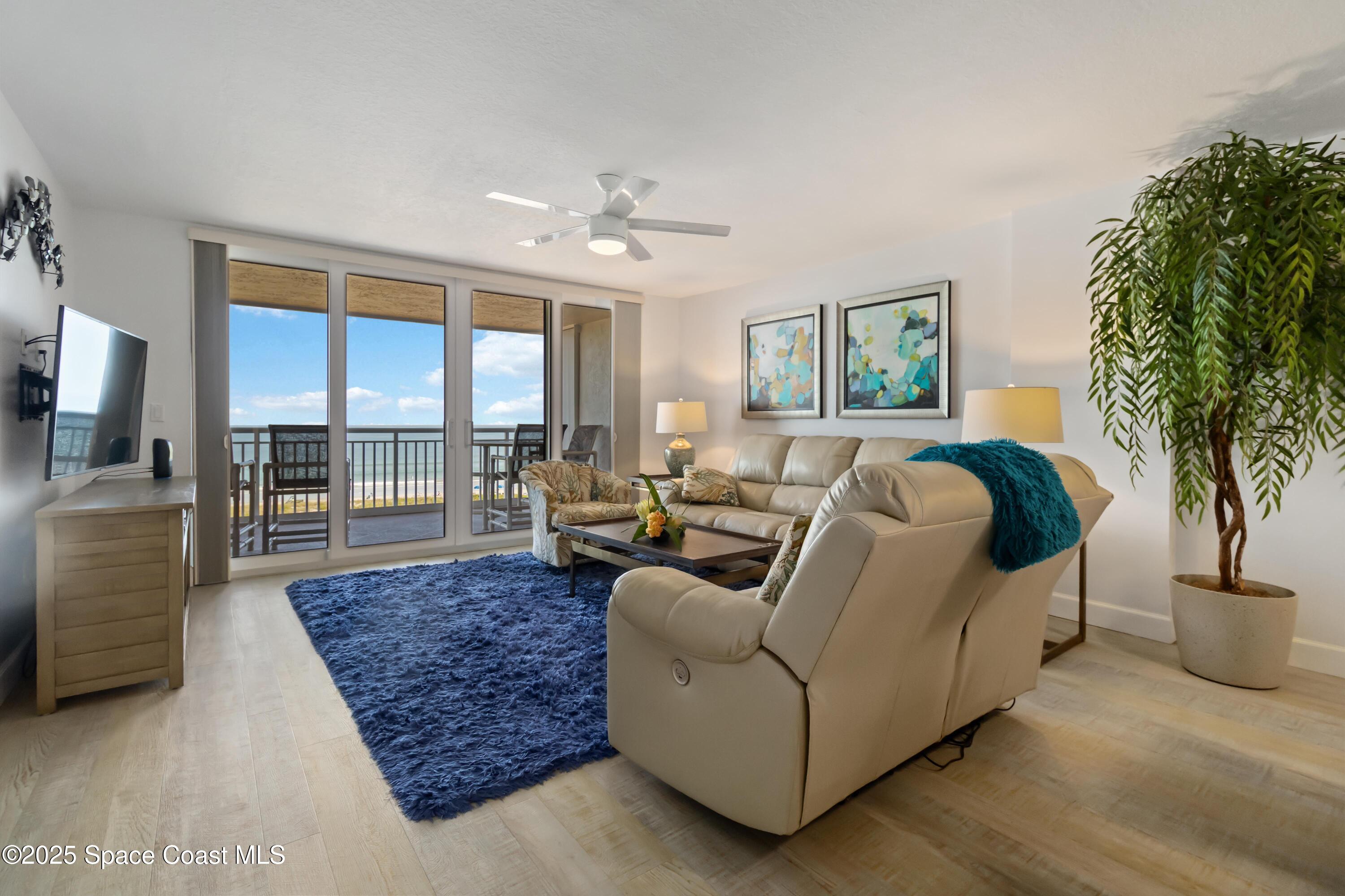 3400 Ocean Beach Boulevard, Unit 610 Cocoa Beach, FL 32931 - Photo 11 of 36 Living Room