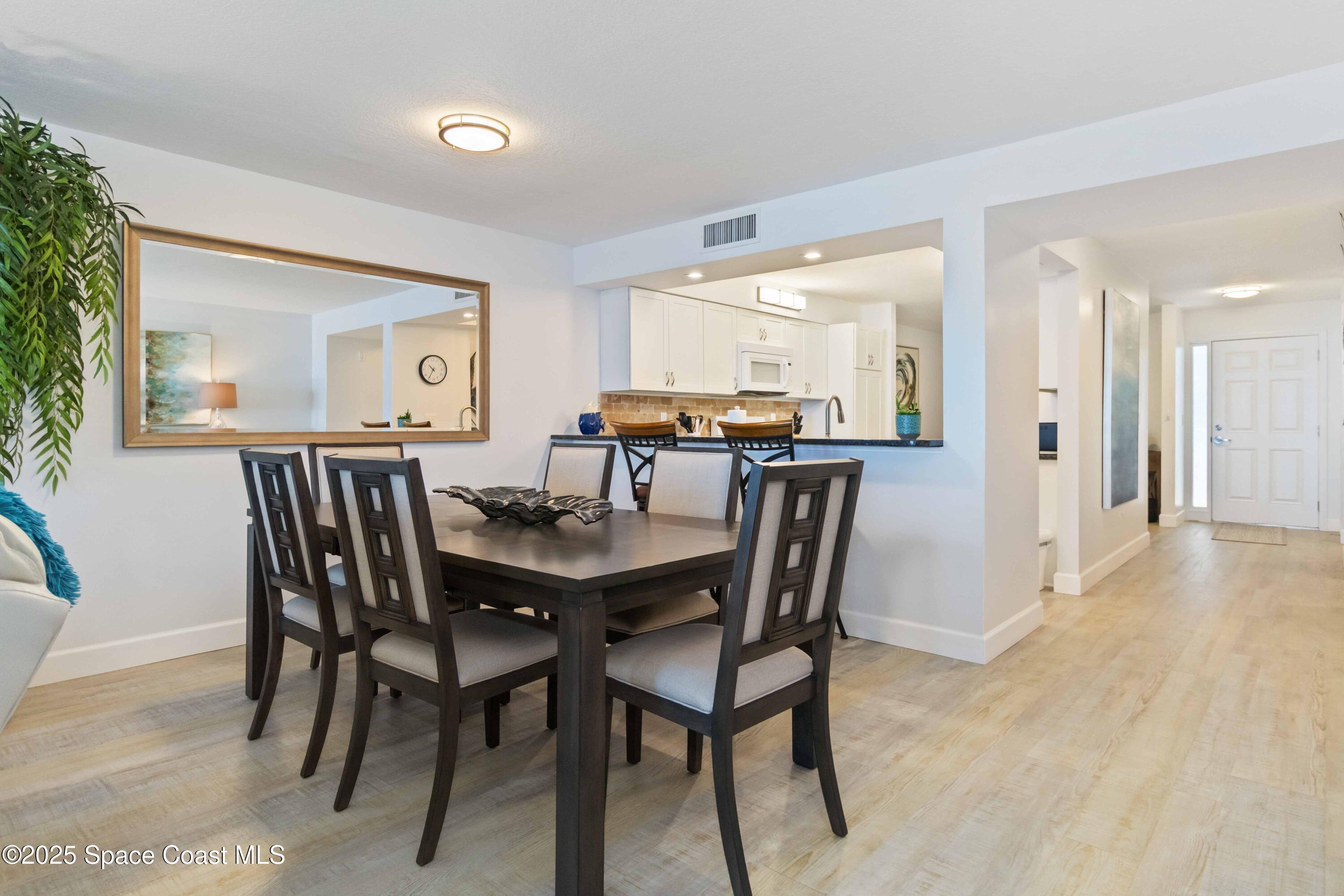 3400 Ocean Beach Boulevard, Unit 610 Cocoa Beach, FL 32931 - Photo 14 of 36 Dining Room