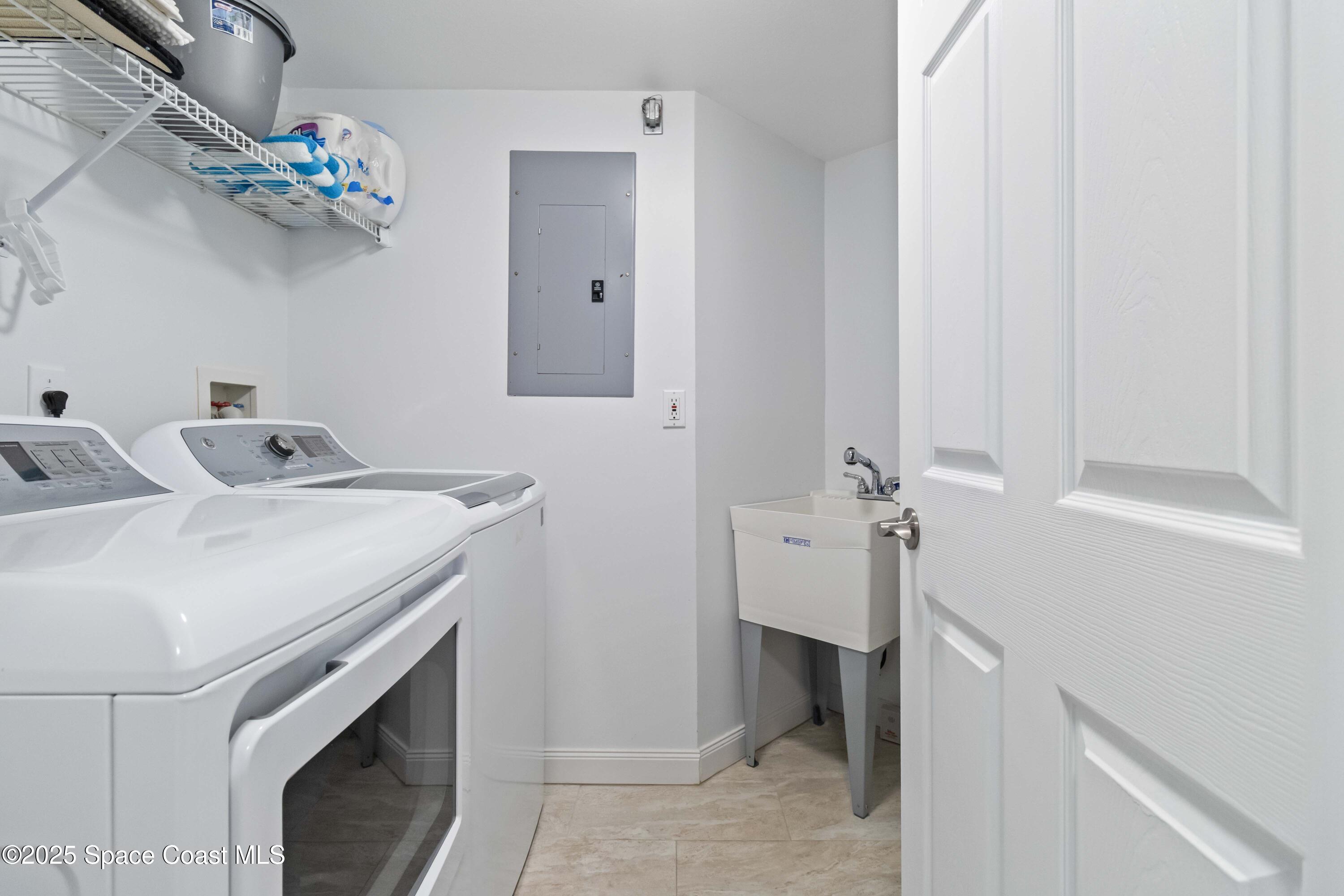 3400 Ocean Beach Boulevard, Unit 610 Cocoa Beach, FL 32931 - Photo 19 of 36 Laundry Room