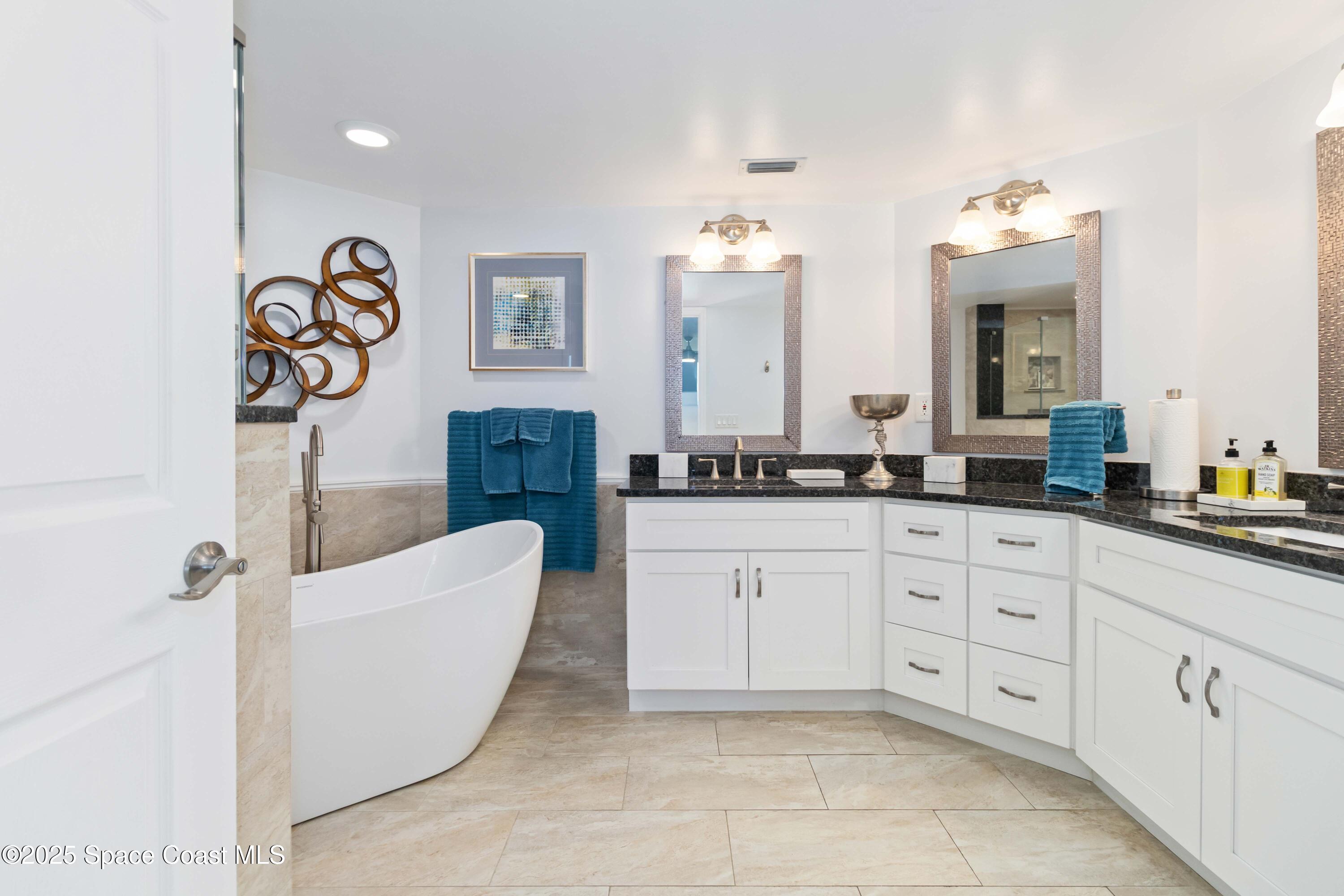 3400 Ocean Beach Boulevard, Unit 610 Cocoa Beach, FL 32931 - Photo 23 of 36 Owner's Bath