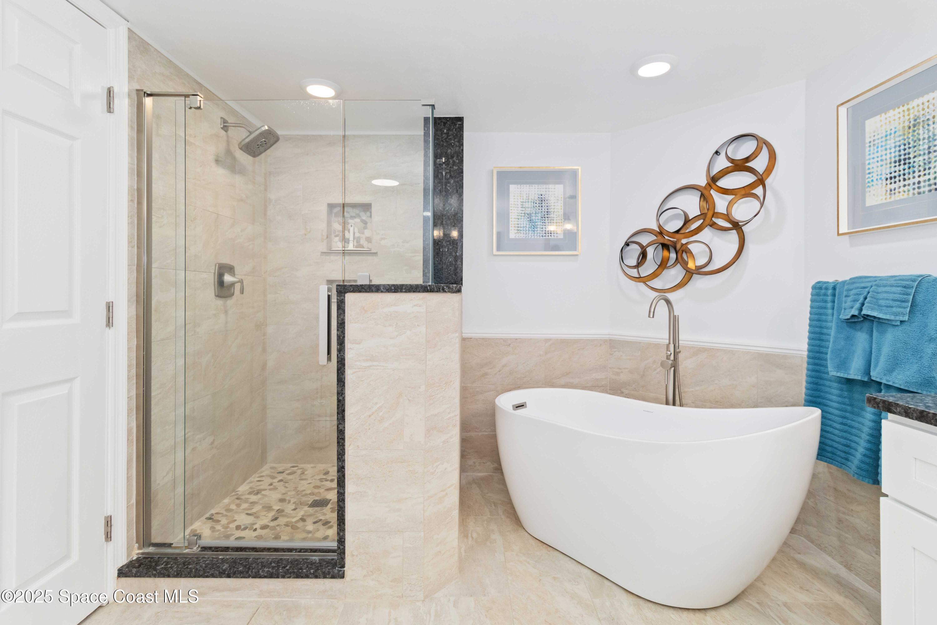 3400 Ocean Beach Boulevard, Unit 610 Cocoa Beach, FL 32931 - Photo 24 of 36 Owner's Bath