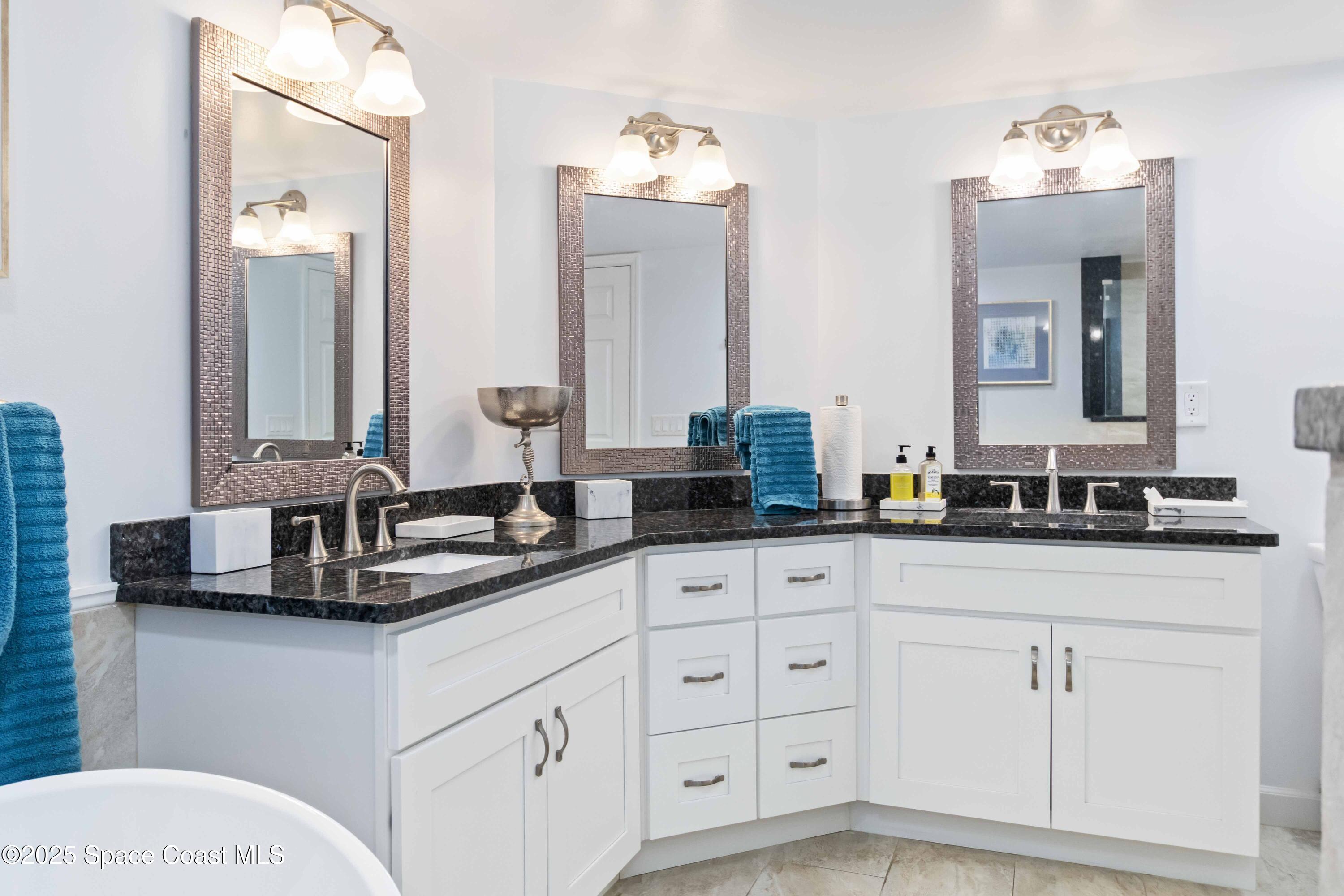 3400 Ocean Beach Boulevard, Unit 610 Cocoa Beach, FL 32931 - Photo 25 of 36 Owner's Bath