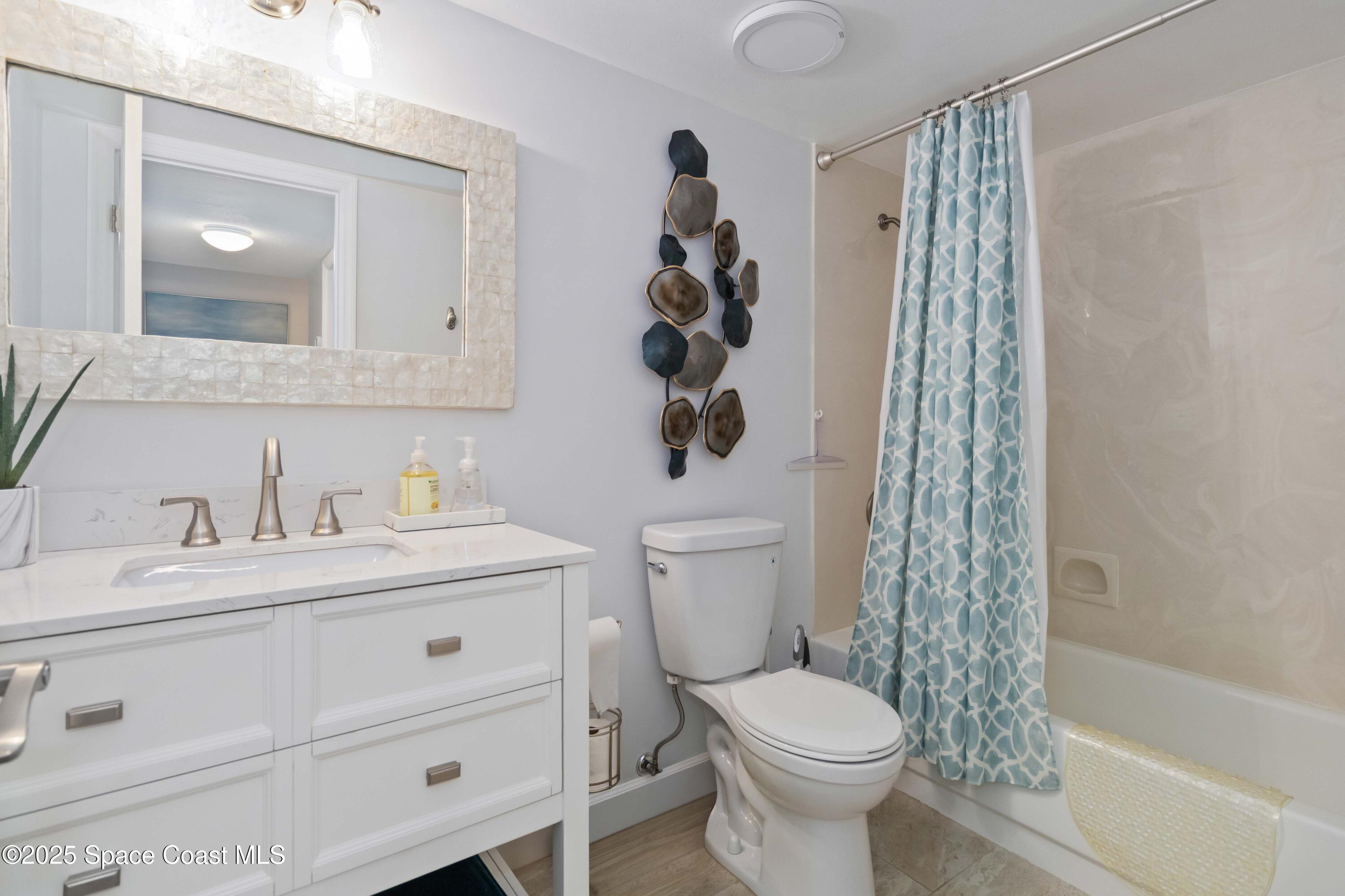 3400 Ocean Beach Boulevard, Unit 610 Cocoa Beach, FL 32931 - Photo 28 of 36 Guest Bath
