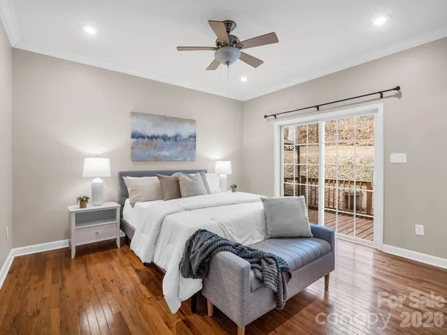 a bed room with a bed and a couch