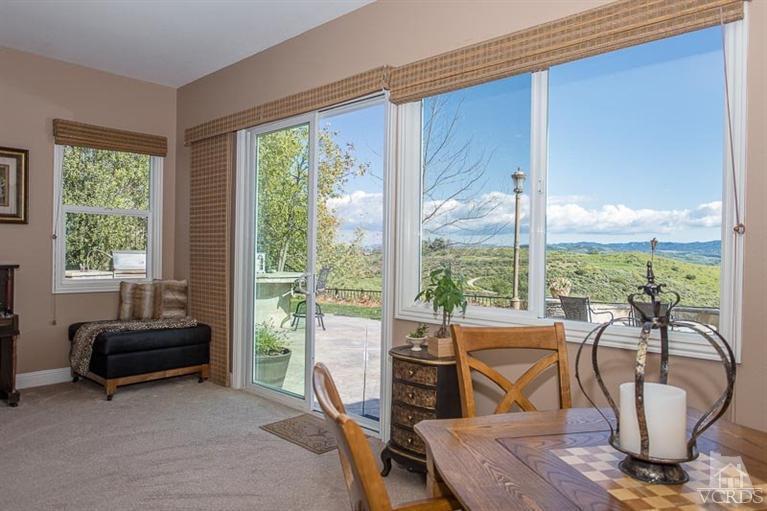 7216 Littler Court Moorpark, CA 93021 - Photo 12 of 92 a view of a dining room with furniture window and outside view