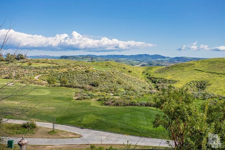 7216 Littler Court Moorpark, CA 93021 - Photo 36 of 92 a view of a lake with a mountain in the background