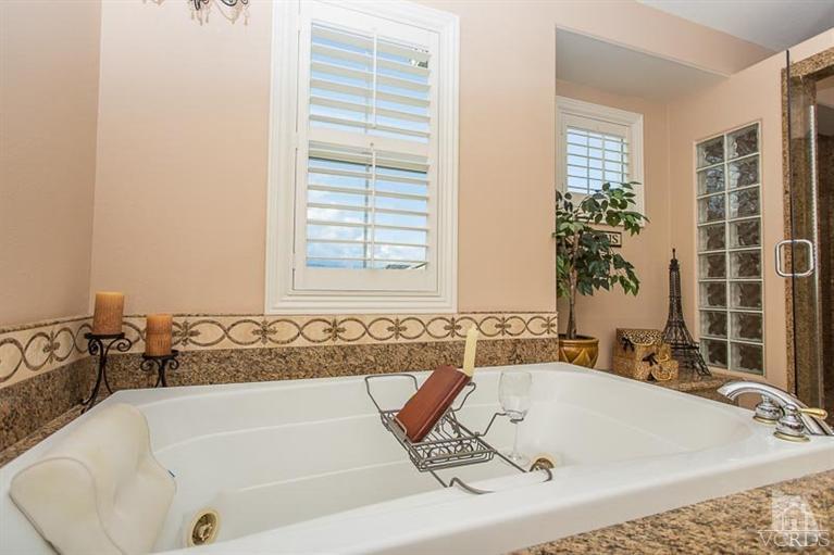 7216 Littler Court Moorpark, CA 93021 - Photo 45 of 92 a bathroom with a bathtub and a sink