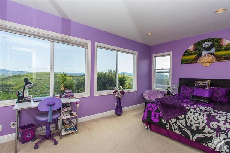 7216 Littler Court Moorpark, CA 93021 - Photo 47 of 92 a bedroom with a bed and large windows