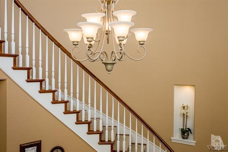 7216 Littler Court Moorpark, CA 93021 - Photo 54 of 92 a view of staircase with railing and frames on wall