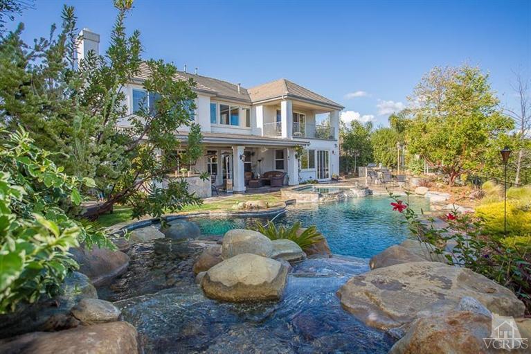 7216 Littler Court Moorpark, CA 93021 - Photo 65 of 92 a view of a swimming pool with a patio and a yard