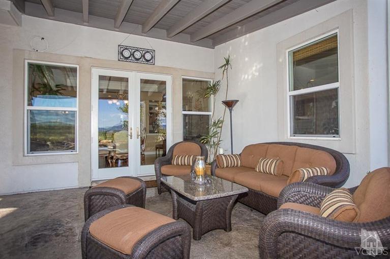 7216 Littler Court Moorpark, CA 93021 - Photo 70 of 92 a living room with furniture and a window