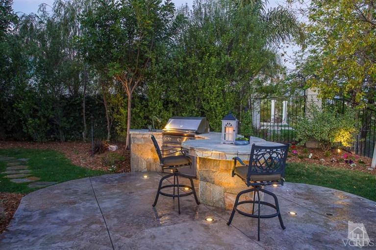 7216 Littler Court Moorpark, CA 93021 - Photo 86 of 92 a view of a backyard with furniture and garden