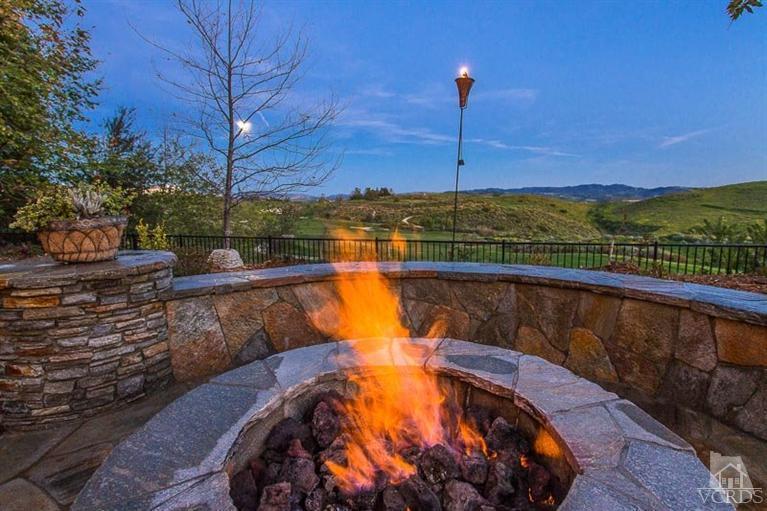 7216 Littler Court Moorpark, CA 93021 - Photo 89 of 92 a view of a swimming pool with a lake view and sitting area