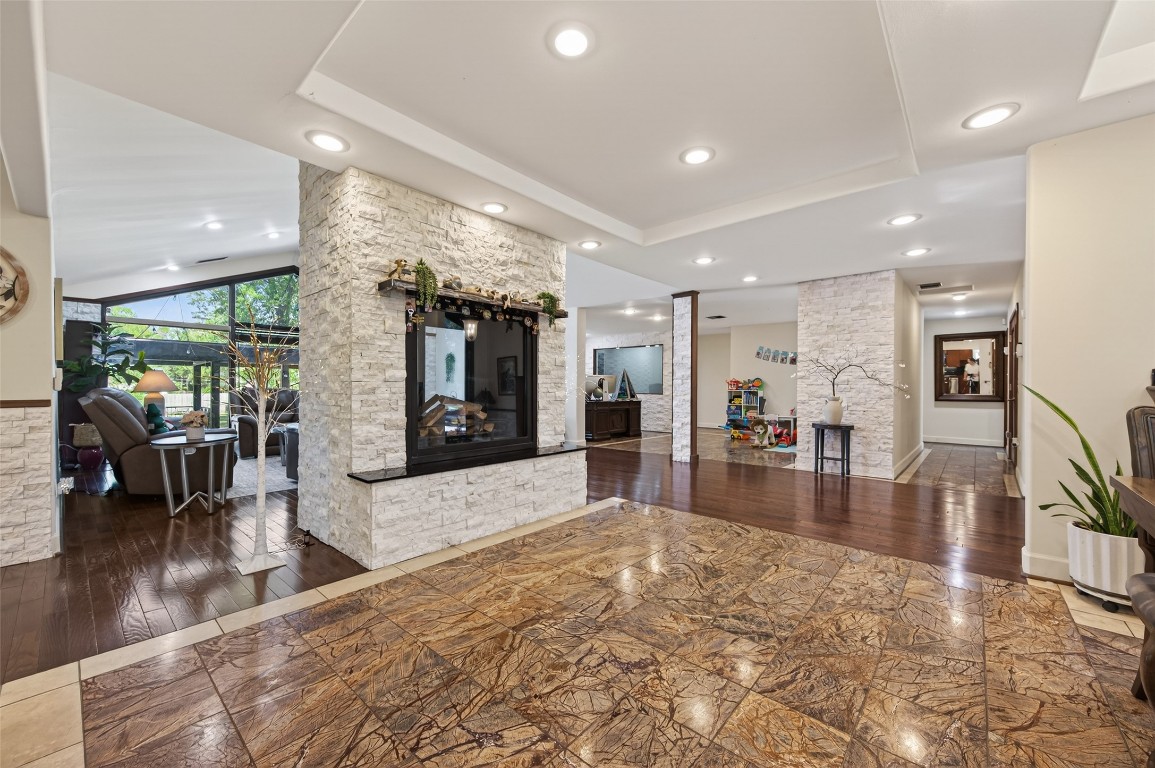 16914 Creeksouth Road Houston, TX 77068 - Photo 11 of 50 a lobby with furniture and a wooden floor