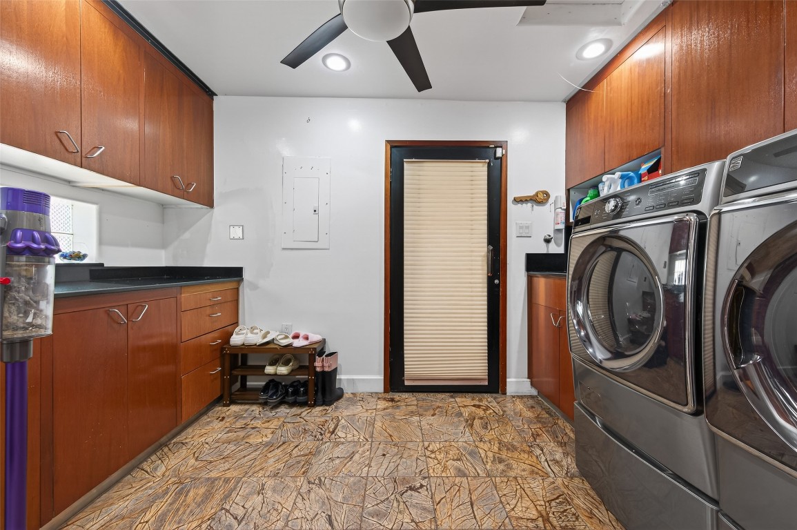 16914 Creeksouth Road Houston, TX 77068 - Photo 21 of 50 a view of a storage & utility room with two washing machine
