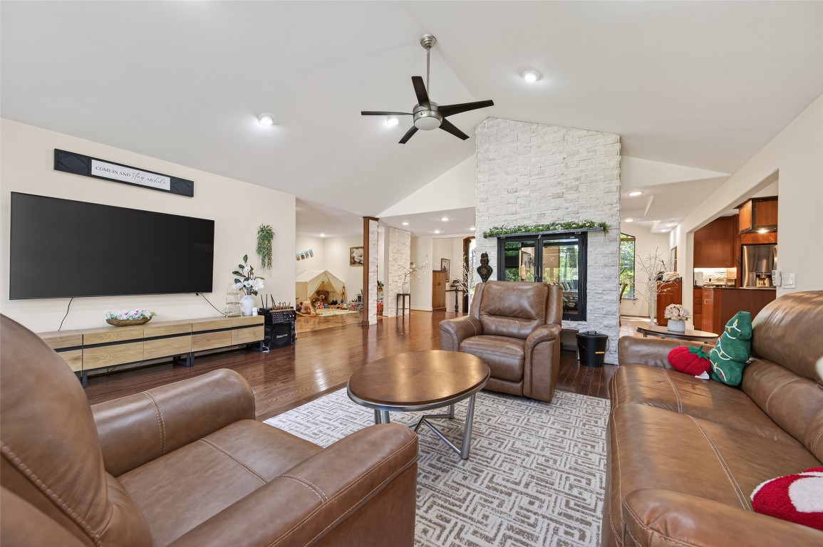 16914 Creeksouth Road Houston, TX 77068 - Photo 26 of 50 a living room with furniture and a flat screen tv