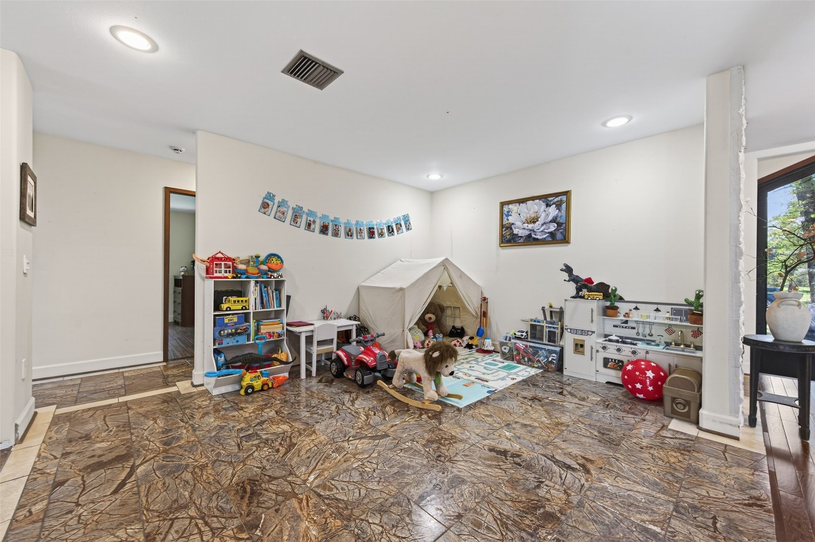 16914 Creeksouth Road Houston, TX 77068 - Photo 28 of 50 a view of a room with toys