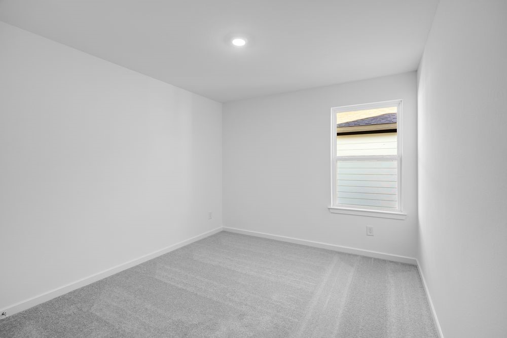22119 Strathfield Circle Cypress, TX 77433 - Photo 15 of 37 an empty room with a window