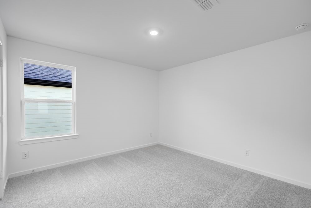 22119 Strathfield Circle Cypress, TX 77433 - Photo 16 of 37 an empty room with a window