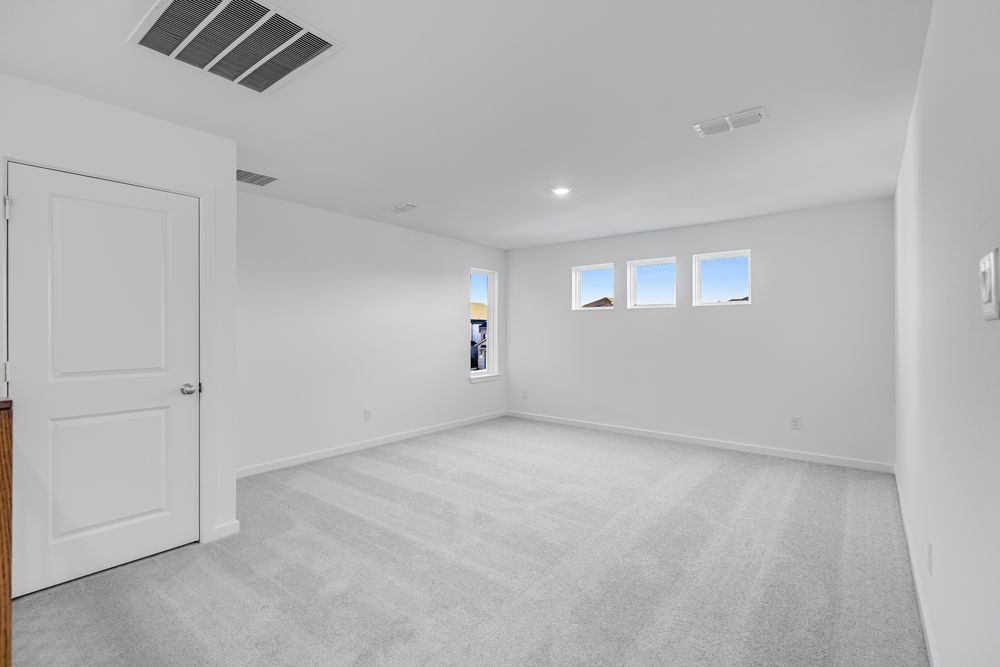 22119 Strathfield Circle Cypress, TX 77433 - Photo 20 of 37 an empty room with windows