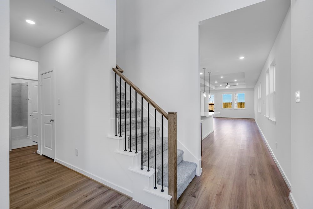 22119 Strathfield Circle Cypress, TX 77433 - Photo 10 of 37 a view of hallway with wooden floor