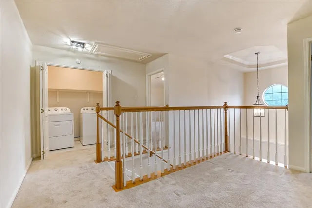 a view of a hallway with closet