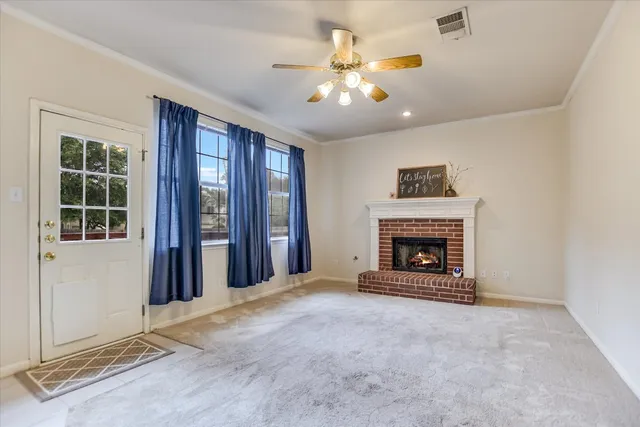 a view of a livingroom with a fireplace