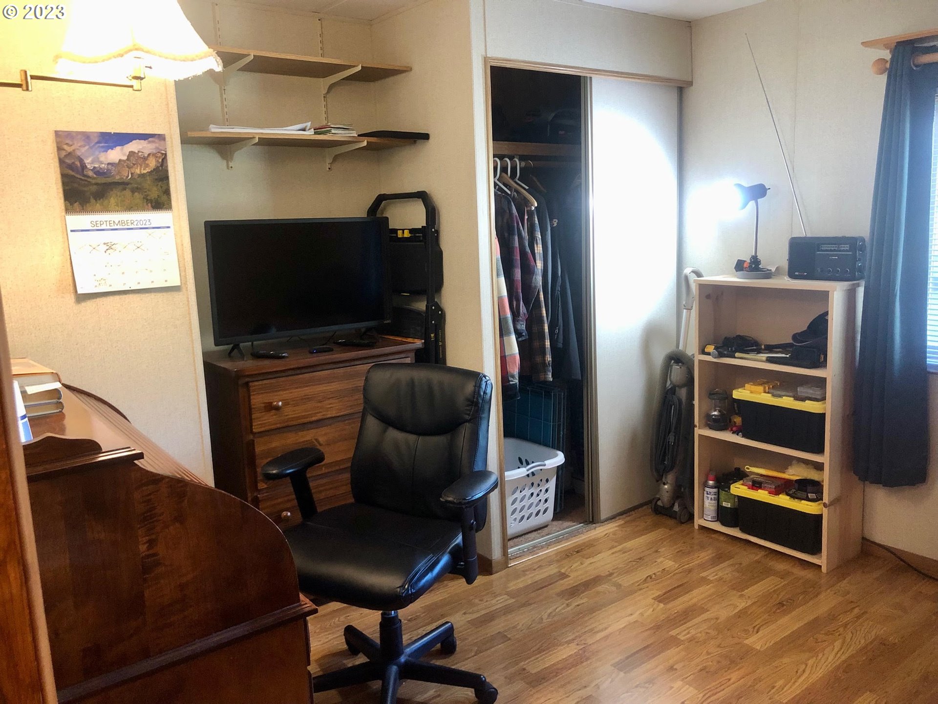 1809 26th Street, Unit 77 La Grande, OR 97850 - Photo 19 of 41 a view of a workspace with furniture and a window