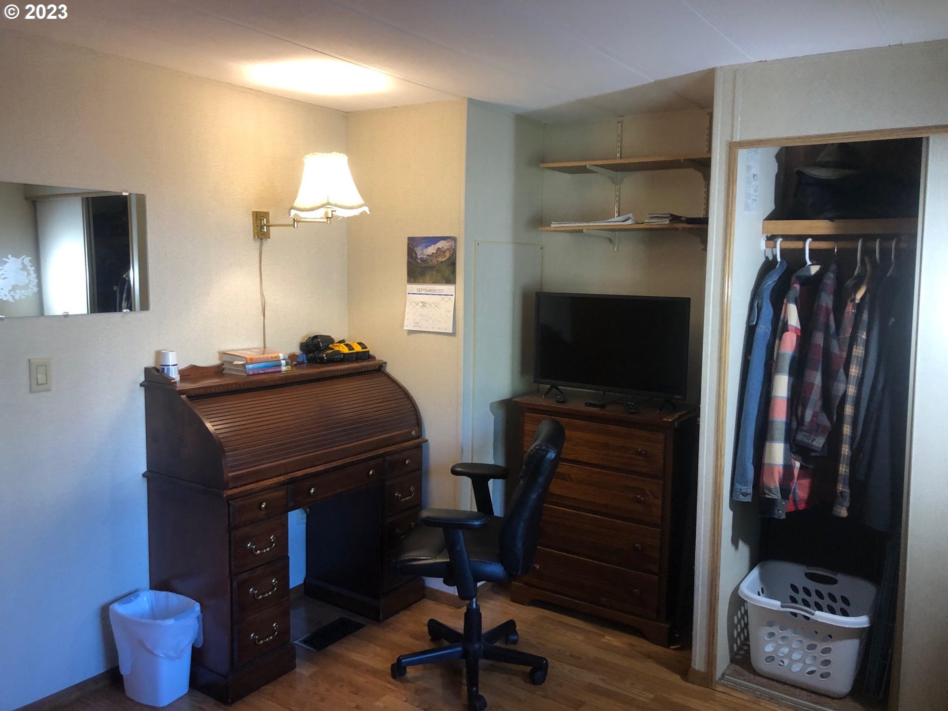 1809 26th Street, Unit 77 La Grande, OR 97850 - Photo 20 of 41 a room with a closet and a mirror
