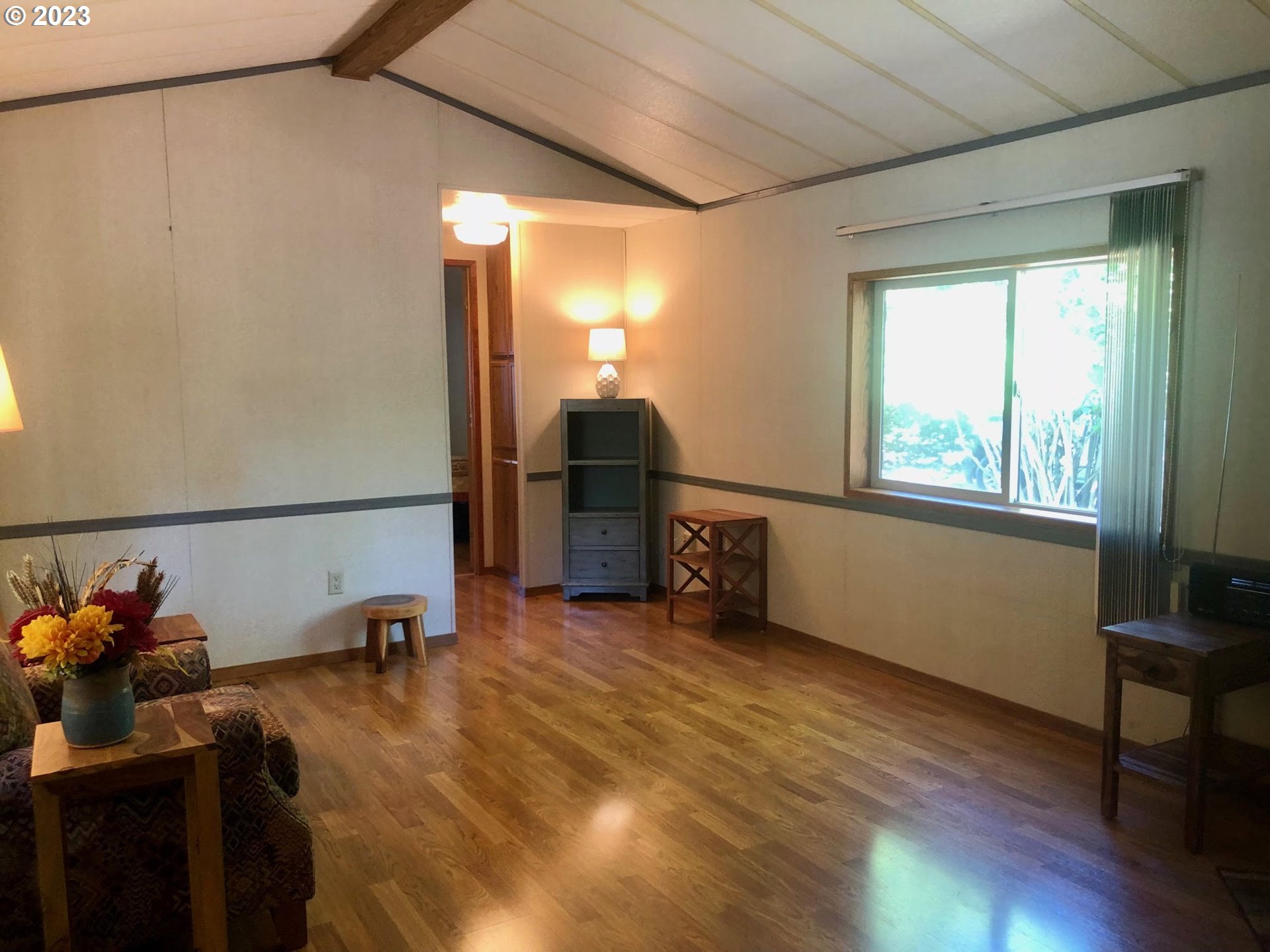 1809 26th Street, Unit 77 La Grande, OR 97850 - Photo 2 of 41 a view of a room with gym equipment and a window