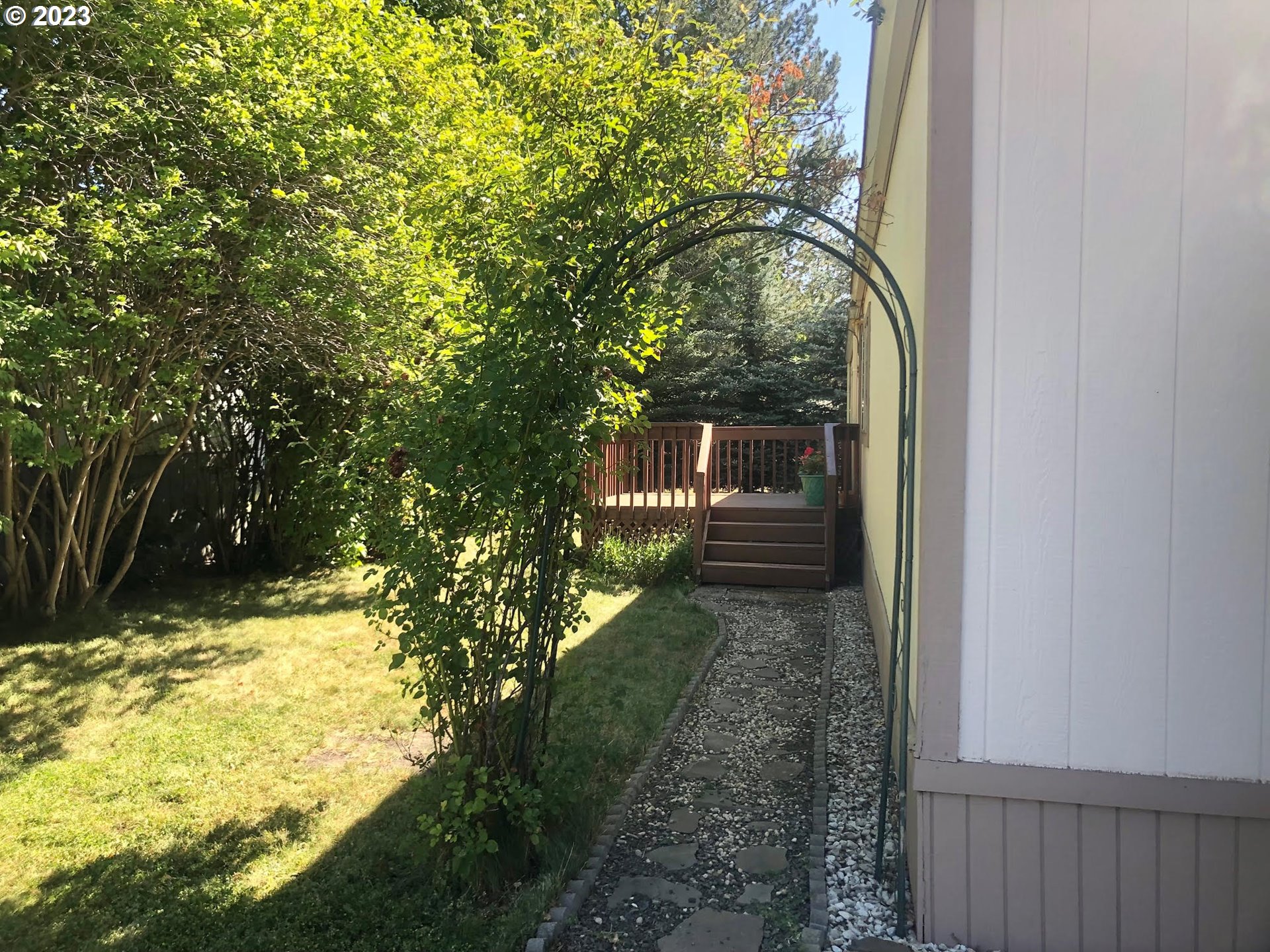 1809 26th Street, Unit 77 La Grande, OR 97850 - Photo 29 of 41 a view of a yard with large trees
