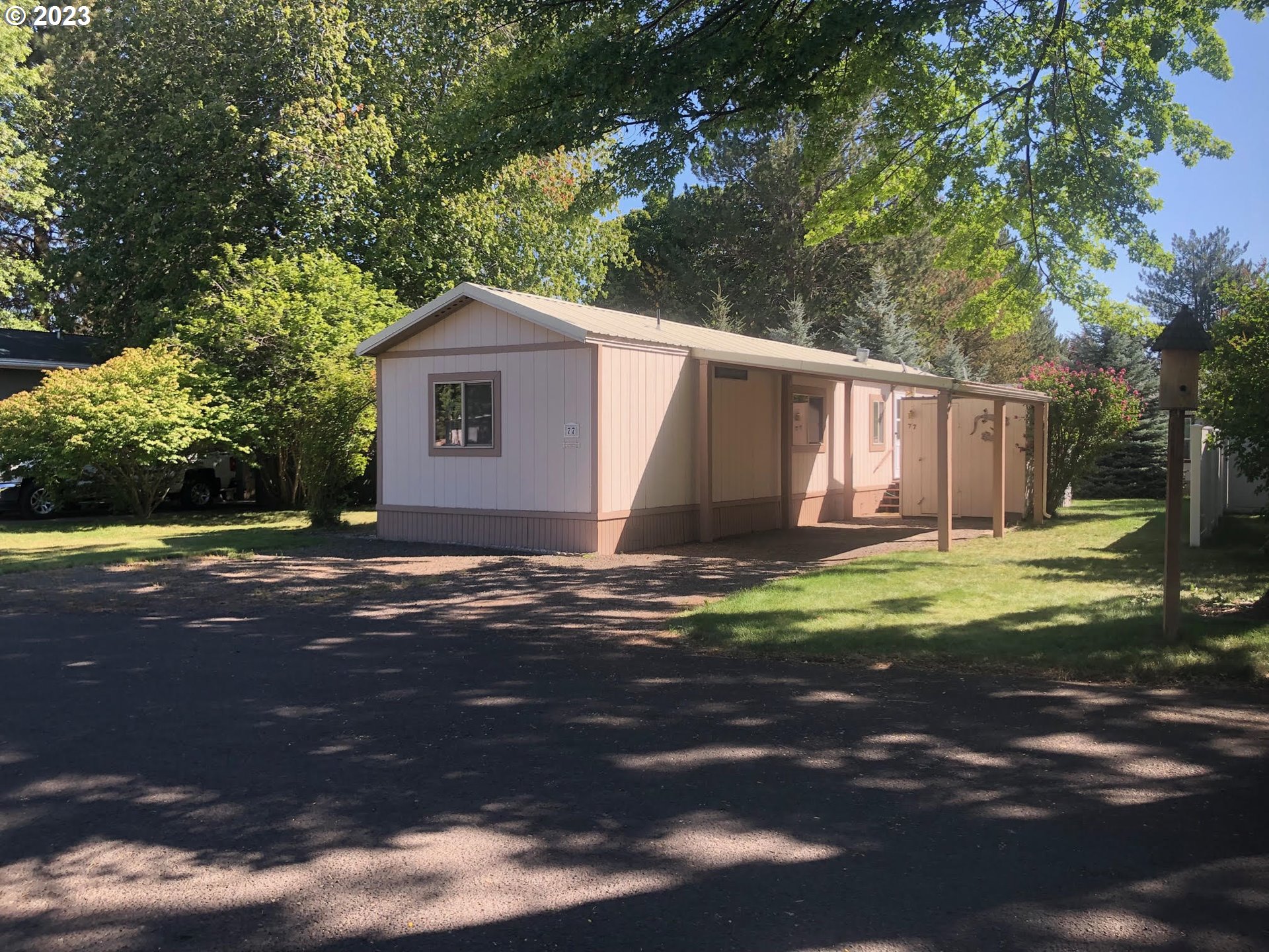 1809 26th Street, Unit 77 La Grande, OR 97850 - Photo 32 of 41 a view of backyard of house