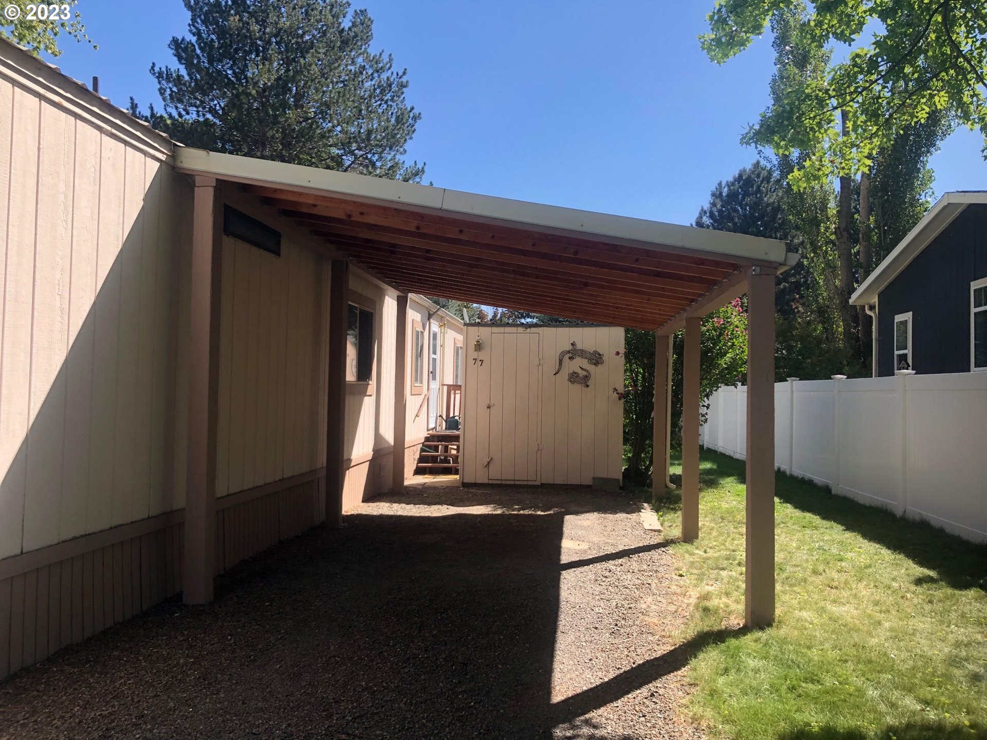 1809 26th Street, Unit 77 La Grande, OR 97850 - Photo 33 of 41 a view of backyard with large tree